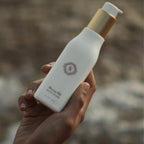 Sorella Apothecary Blueberry Milk Moisturizer hand-held lifestyle image