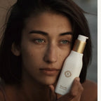 Sorella Apothecary Blueberry Milk Moisturizer lifestyle image with model