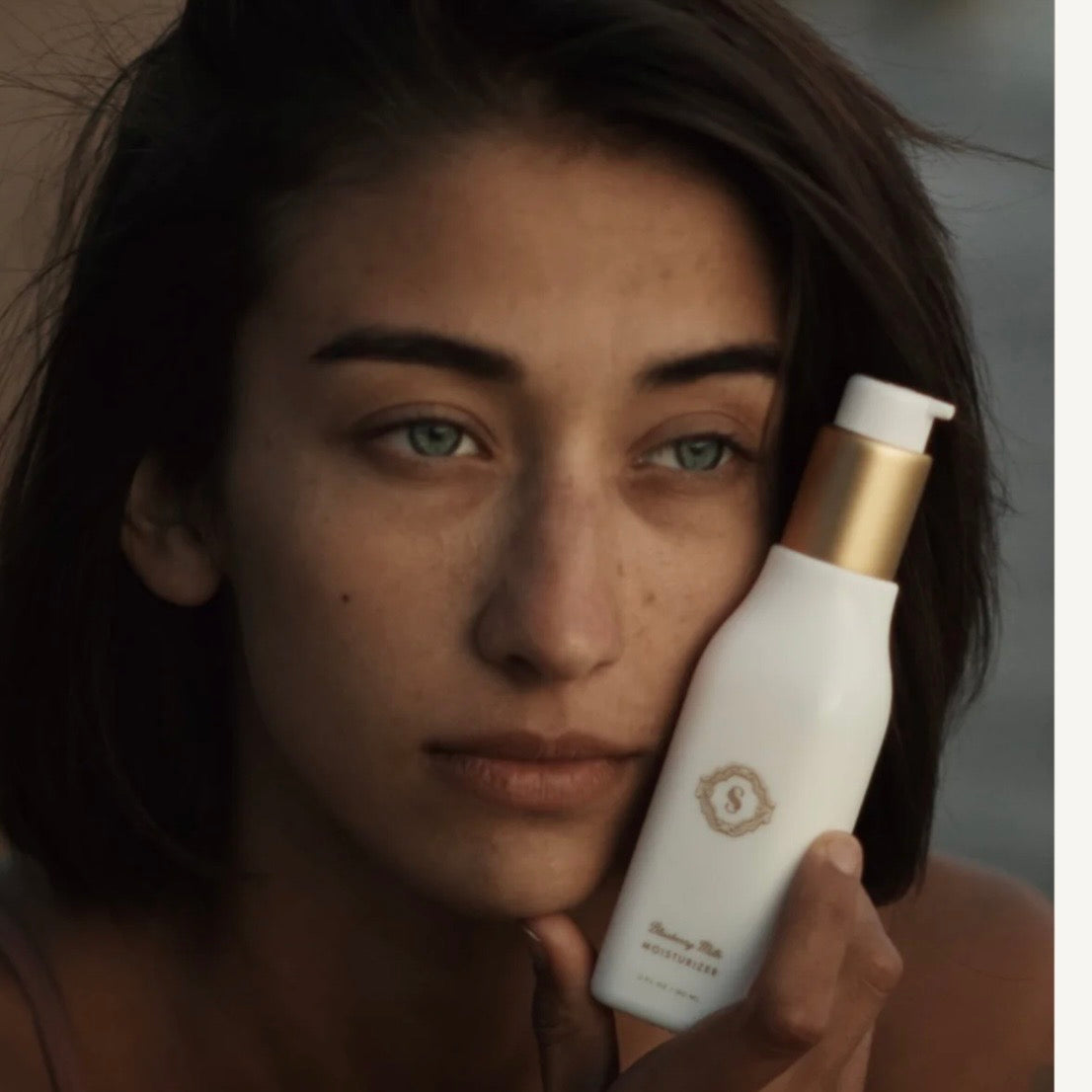 Sorella Apothecary Blueberry Milk Moisturizer lifestyle image with model